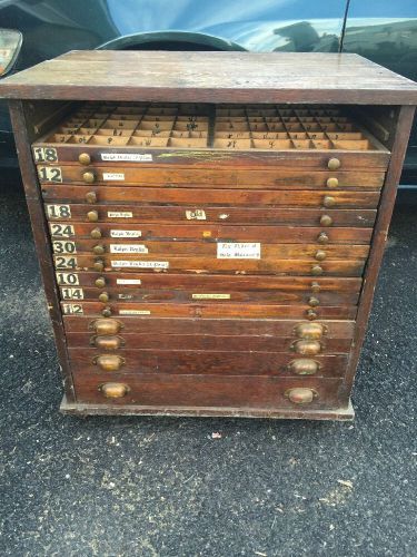 VINTAGE SMALL LETTERPRESS TYPE AND PRINT BLOCK CABINET ON CASTERS