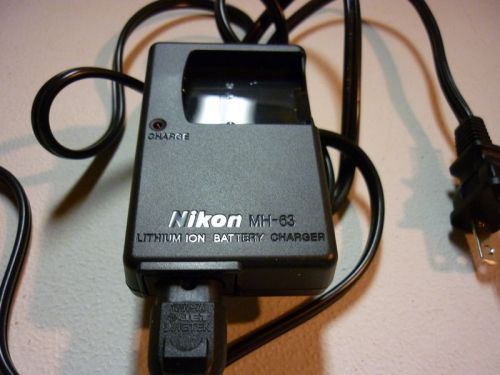 1 USED NIKON MH-63 LITHIUM ION BATTERY CHARGER AND 1 NEW LI-ION BATTERY