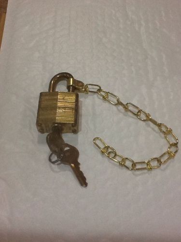 Master lock commercial padlock with chain to attach lock to wall and 2 keys gold for sale