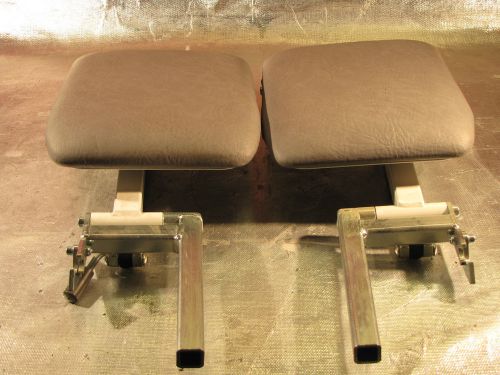 Two Gray Footpads with Pneumatic Adjustments