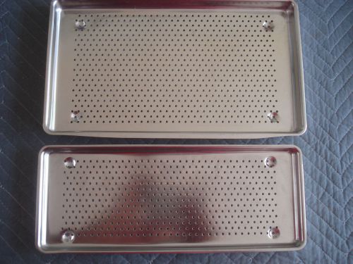 Two stainless steel perforated sterilization trays for sale