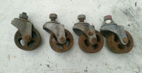 Set of 4 antique vintage cast iron industrial caster cart table wheels for sale