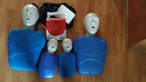 4 Cpr manikins and 1 aed trainer