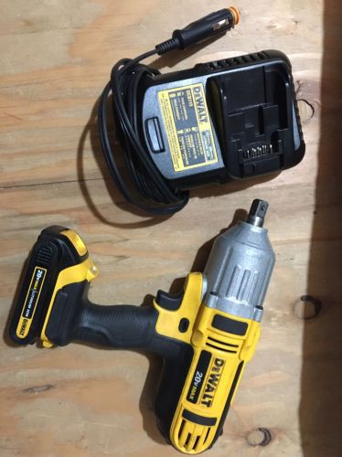 Barely used dewalt 20v lithium 1/2 inch impact gun and car charger for sale