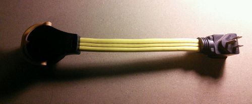 Yellow and black r.v. three plug cord for sale