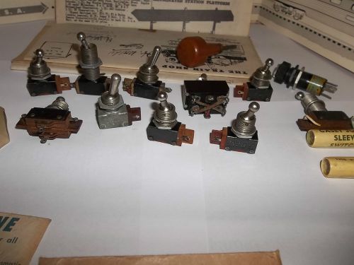 Lot of vintage train parts switches,electric,screws.springs,other small parts ho for sale