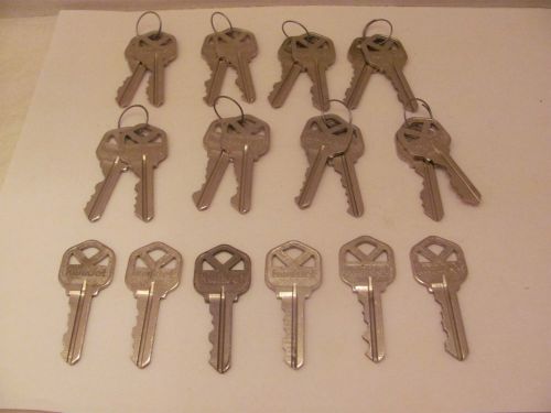 Used - cut &#034;kwikset&#034; nickel plated keys - (keyway - kw1) / (9 pairs / 6 singles) for sale
