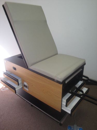 Used hausmann 4440 power base exam table hi-low excellent condition ada 400lb for sale