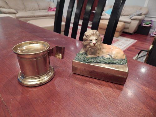 Vintage Brass Roll Postage Stamp Dispenser and figural lion stamp holder.