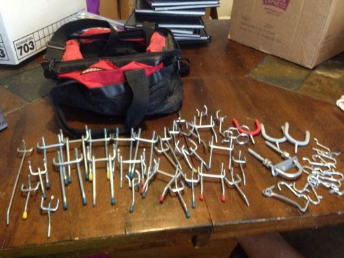 Lot various size used peg board And Screw hooks Pictures are of actual items.