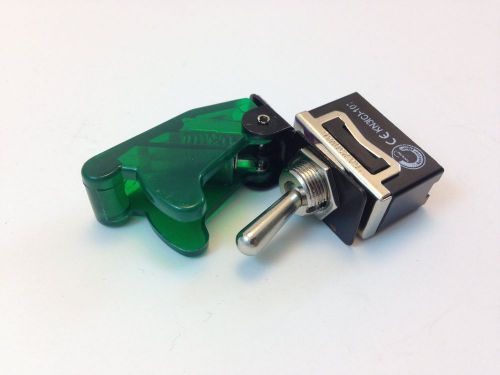 On/off spst 2p toggle switch spade term w/cover trans green 20a  #661901/665020 for sale