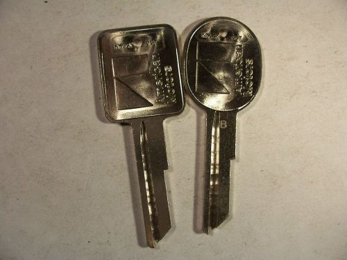 1 set  oem  amc  gm    1972 - 1986 key blank  with knockout in plase  uncut for sale