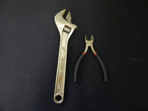 ADJUSTABLE WRENCH AND WIRE CUTTERS