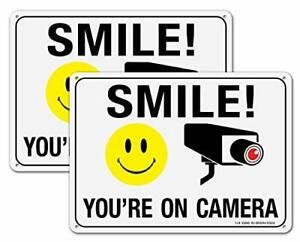 Smile You&#039;re on Camera Sign Video Surveillance Sign - 2 Pack - 7 x 10 Inches -