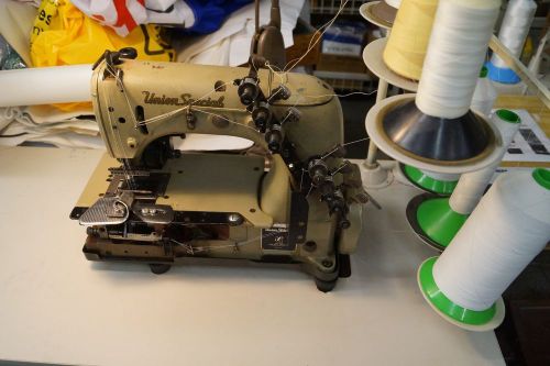 UNION SPECIAL 54400 12 NEEDLE CHAIN STITCH SEWING MACHINE WITH PULLER SINGER 300