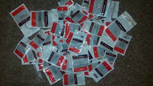 Misc condensers, elements, fuses, amps, plugs, capacitors, and connectors for sale