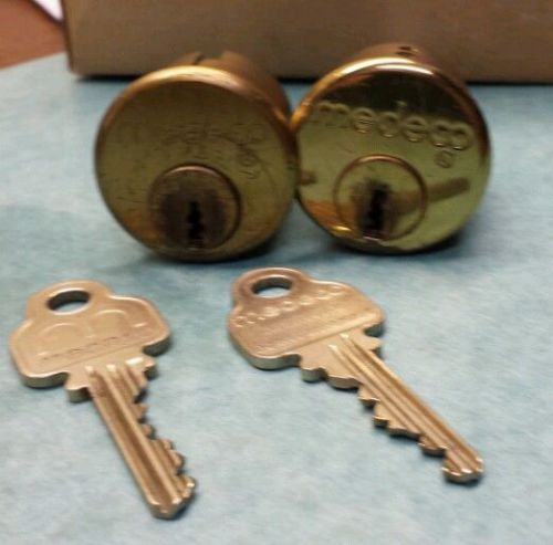 Two medeco rim cylinders brass -1 key each &amp; cylinder only -used good condition for sale