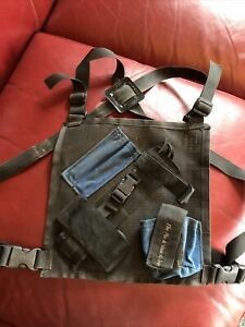 Two way radio chest harness made by The Pack Shack. Used but good condition.