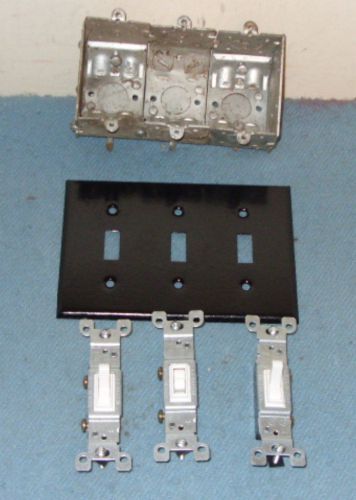 Three new white leviton wall switches and used  3 gang metallic box &amp; cover for sale