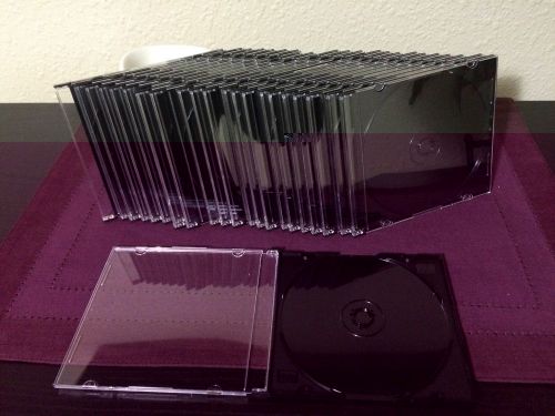 New slim jewel cases 50 cd or dvd cases 5.2 mm thick black back / clear front for sale