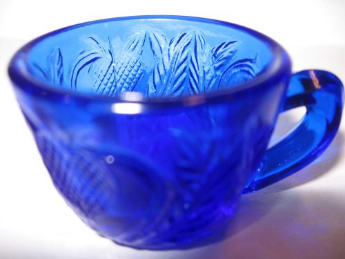Cobalt blue glass salt dip / cellar celt strawberry mug pattern art master child