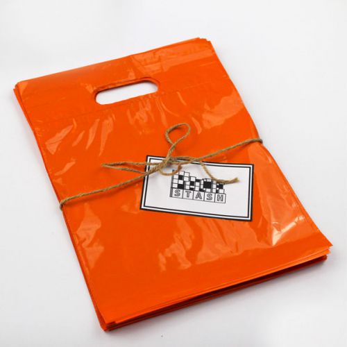 500 16x18 orange plastic retail die-cut handle merchandise bag - boutique for sale