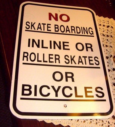 No skateboarding inline or roller skates or bicycles sign, aluminum 12&#034; x 18&#034;