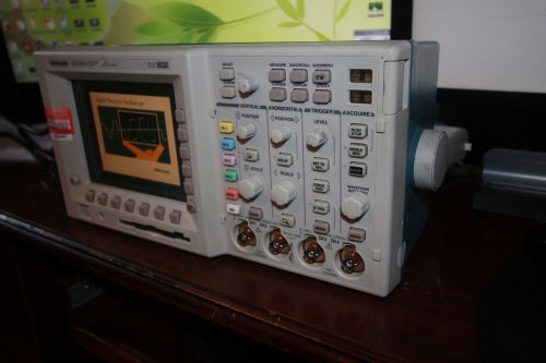 Tektronix TDS3034 300 MHz 2.5GS/s 4 Channel DSO options TDS3TRG and TDS3FFT