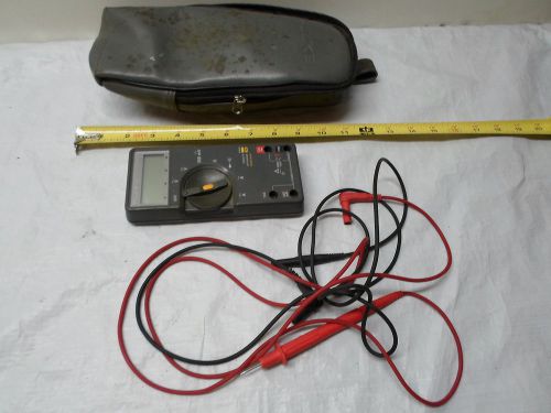 Used: Fluke 75 Multimeter Series II  with probes and case (case has mold on it)
