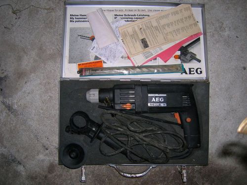 AEG Hammer Drill used  5 or 6 times, comes with hard case and original documents