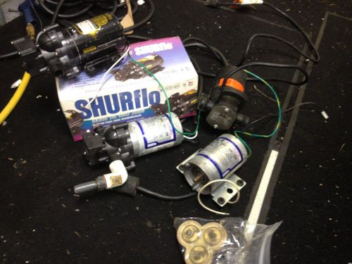 SHURFLO PUMPS 4  AND PARTS SHOWN