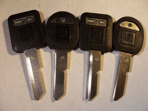 4 KEYS  GM  NOS  E &amp; H   BRIGGS &amp; STRATTON WITH KNOCK OUT KEY BLANK   UNCUT