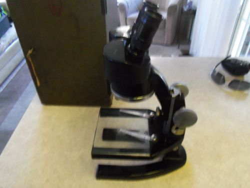 vintage ao microscope with original locking box working condition