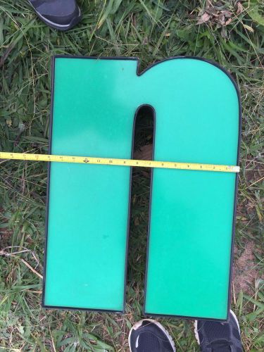 Green Lower Case &#034;n&#034; or &#034;u&#034; channel letter, black trim, black Aluminum sides