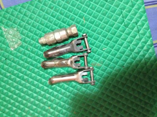 Three used graco spray gun triggers with trigger pins &amp; swivel fitting for sale
