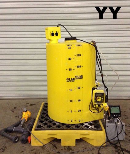 Lmi milton roy  electromagnetic dosing pump w/ 35 gal composite tank &amp; meter for sale
