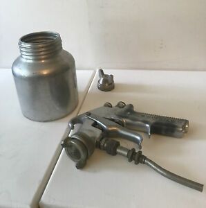 Miscellaneous Parts:DeVilbiss paint sprayer, cup.