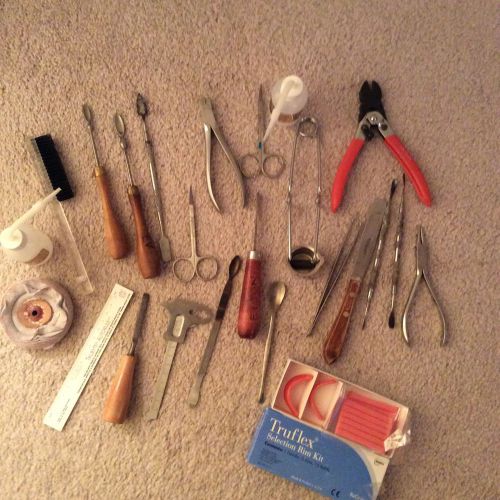 Assorted Tools And Dental Supplies