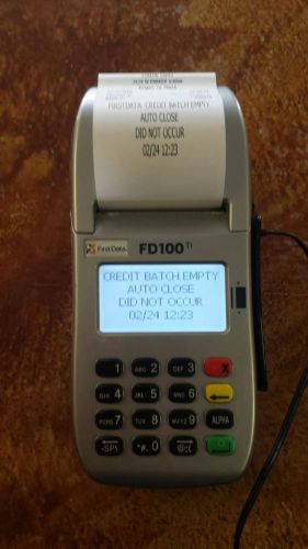 FIRST DATA FD100TI  DUALCOMM CREDIT CARD TERMINAL PERFECT CONDITION WITH ROLLS!