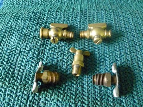 1 BRASS VALVE AND 4 BRASS PET COCKS  LOT