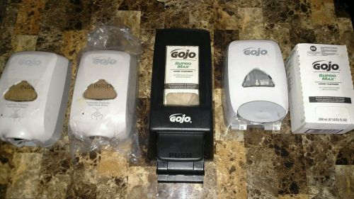 Lot of gojo soap dispensers