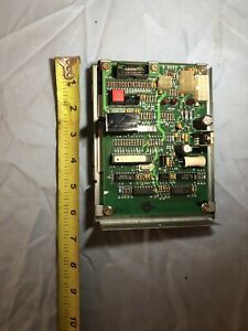Used Dixie Narco circuit board with cover for a soda machine