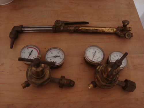 Cutting torch with o2 and acetylene  regulators for sale