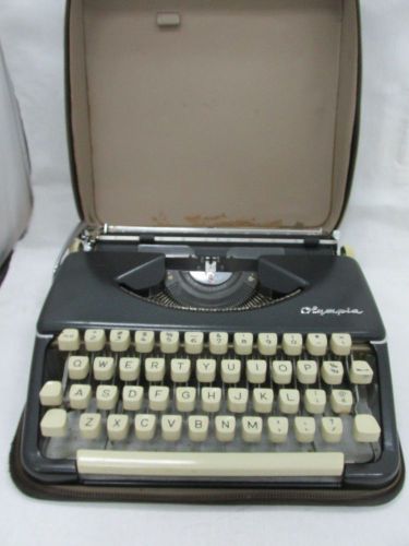 Vintage Olympia Werke AG Wilhelmshaven Portable Typewriter with Hard Case