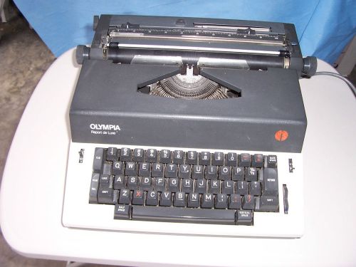 Olympia  International Report De Luxe Electric Typewriter