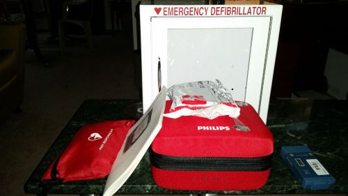 Philips heartstart onsite defibrillator  m5066a w/ alarmed aed cabinet  with key for sale