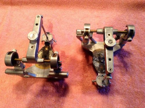 TWO Hanau fully adjustable dental articulators with numerous mounting rings