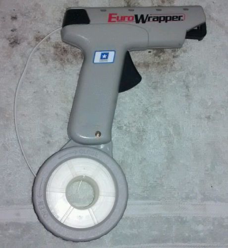 used EURO WRAPPER STRAP DISPENSER with spool no locks or extra refills