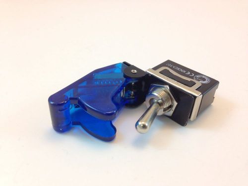 On/off spst 2p toggle switch spade term w/cover trans blue 20a  #6661901/665019 for sale