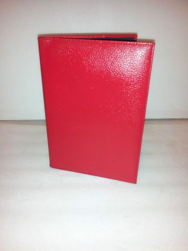 Staples red leather binder with  ribbon book marker and place for 3 credit cards